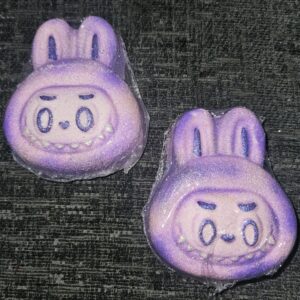 Purple babu head bath bomb
