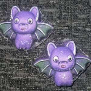 Purple bat green apple